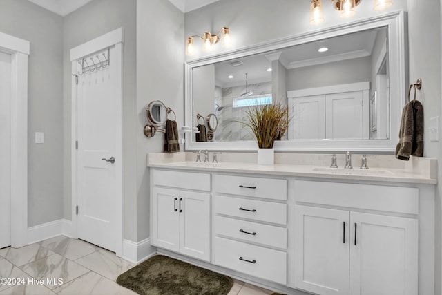 bathroom with vanity and ornamental molding