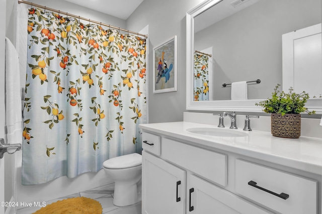 full bathroom featuring toilet, vanity, and shower / tub combo