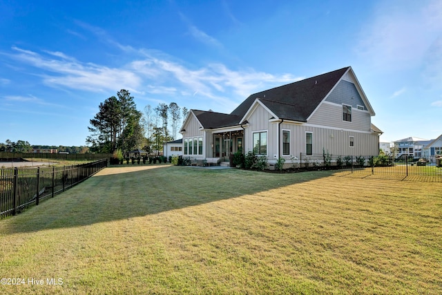 view of home's exterior with a lawn