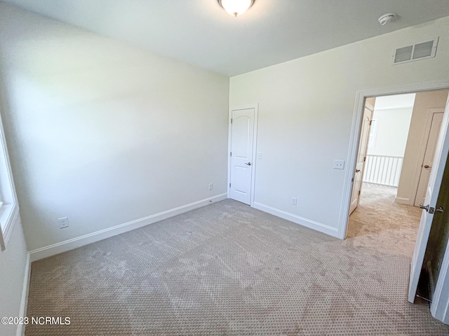 107 Freedom Park Rd, Beaufort, NC 28516 - unfurnished bedroom featuring carpet flooring and baseboards