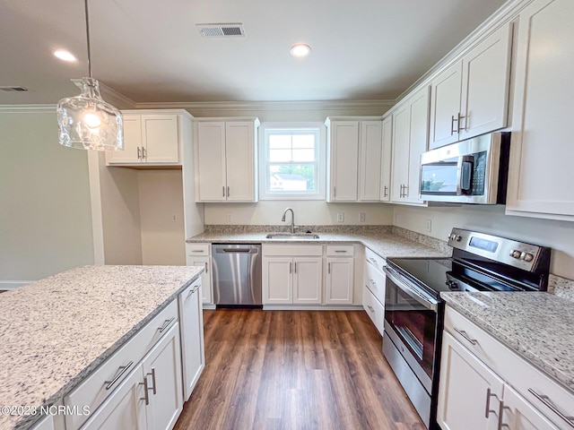 kitchen featuring sink, white cabinetry, and stainless steel appliances