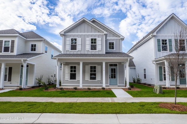 view of front of property with a front lawn