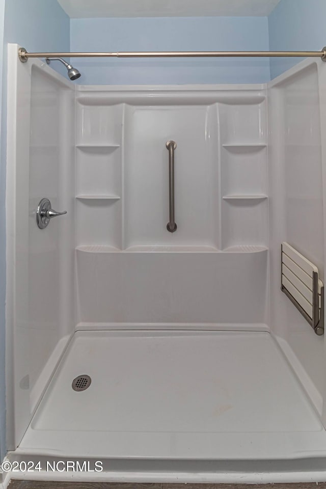 bathroom featuring walk in shower