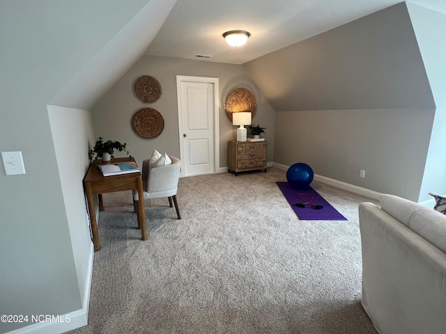 home office featuring lofted ceiling, baseboards, visible vents, and carpet flooring