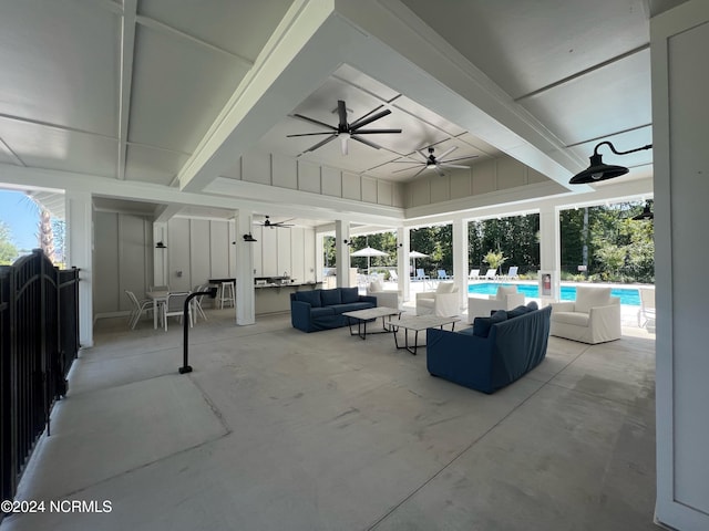 view of patio with an outdoor pool, ceiling fan, and an outdoor living space