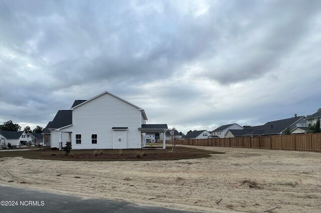 view of front of home featuring a garage and covered porch