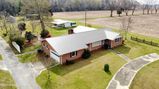 birds eye view of property featuring a rural view