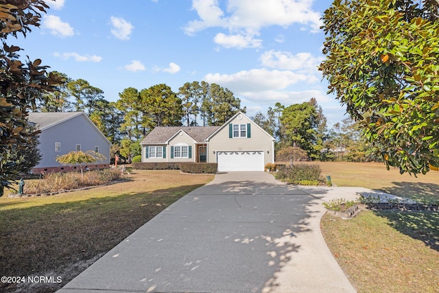 front of property with a front yard and a garage