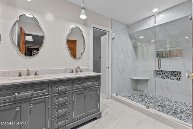 bathroom featuring vanity and an enclosed shower