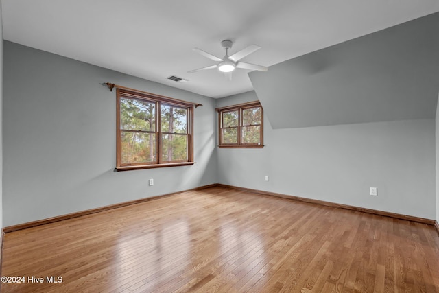 bonus room featuring light hardwood / wood-style flooring, ceiling fan, and lofted ceiling