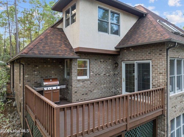 exterior space featuring a wooden deck