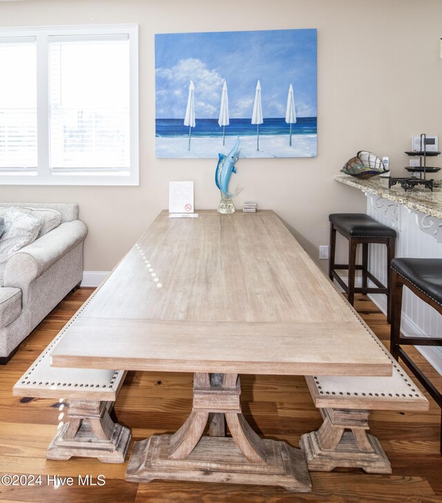 dining room with hardwood / wood-style floors