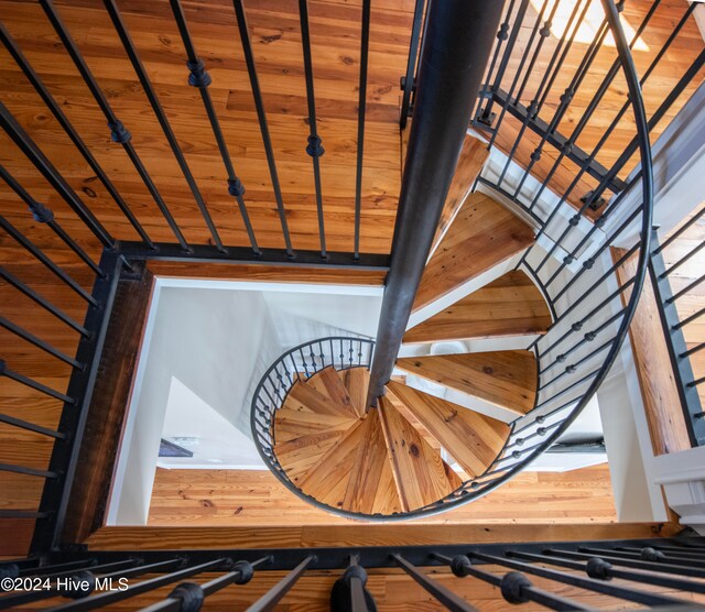 stairway featuring wood ceiling