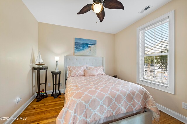 bedroom featuring ceiling fan and wood-type flooring