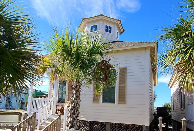 view of property exterior featuring cooling unit