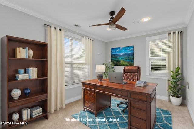 carpeted home office with crown molding and ceiling fan