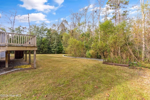 view of yard with a deck