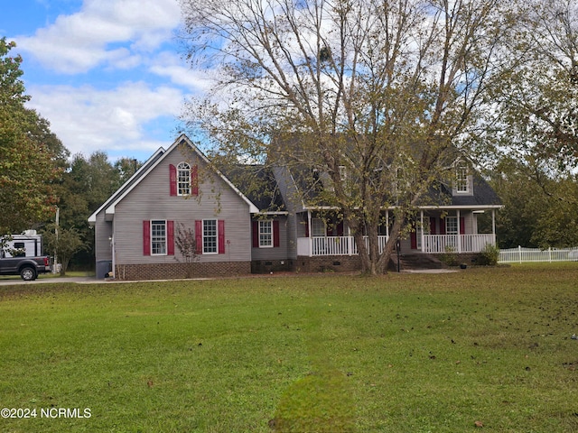 view of front of home featuring a porch and a front lawn