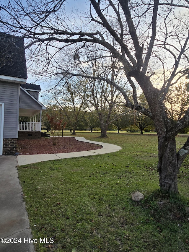 yard at dusk with a porch