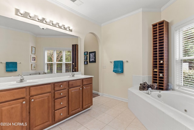 bathroom with ornamental molding, tile patterned floors, tiled bath, and vanity