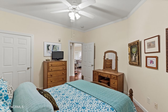 bedroom with ceiling fan and crown molding