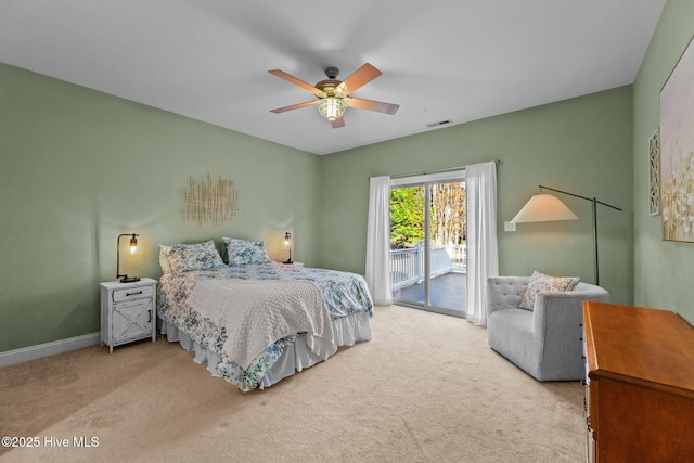 carpeted bedroom with access to outside and ceiling fan