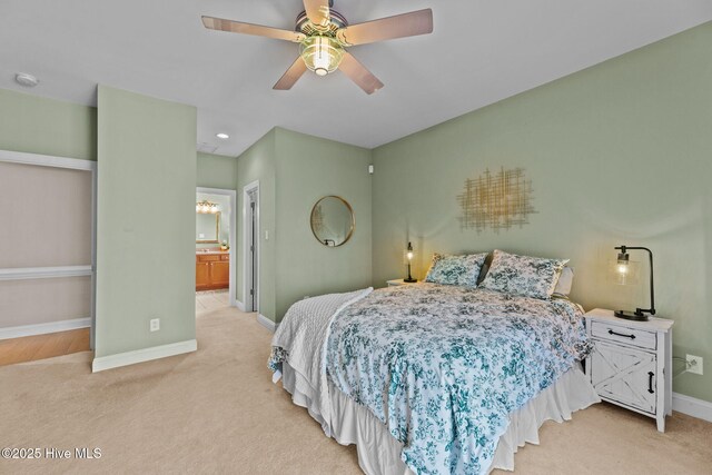 bedroom with light carpet, baseboards, visible vents, a ceiling fan, and access to outside