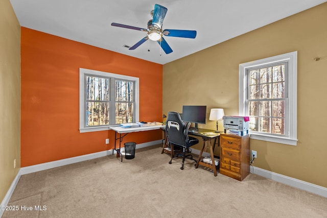 office area featuring ceiling fan and light colored carpet