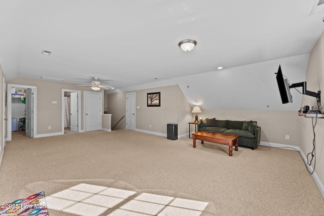 living room with ceiling fan, carpet floors, and vaulted ceiling