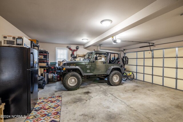 interior space with vaulted ceiling, carpet flooring, an upstairs landing, and baseboards