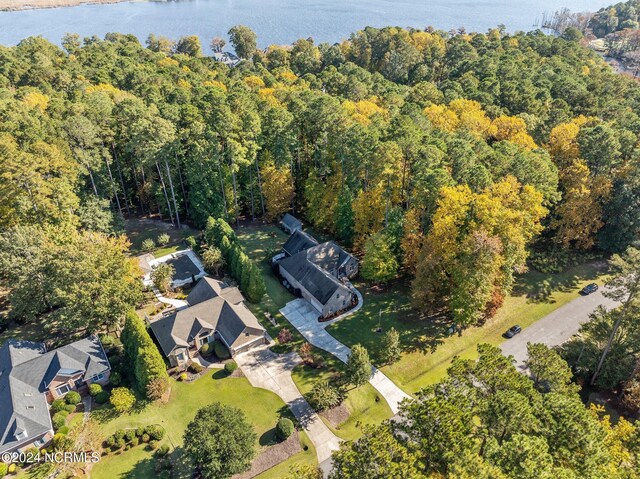 view of home's exterior featuring a patio, brick siding, crawl space, and a lawn