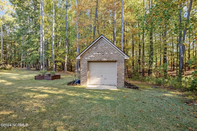 exterior space with a garage and an outdoor structure