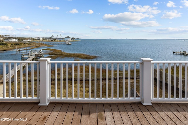 property view of water featuring a boat dock