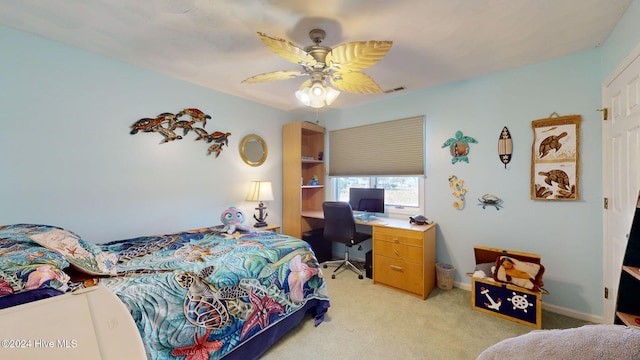 carpeted bedroom featuring ceiling fan