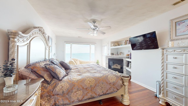 bedroom featuring ceiling fan and hardwood / wood-style flooring