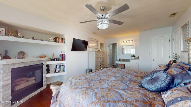 bedroom featuring ceiling fan and dark hardwood / wood-style flooring