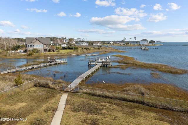 dock area with a water view