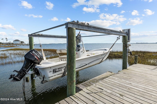 dock area featuring a water view