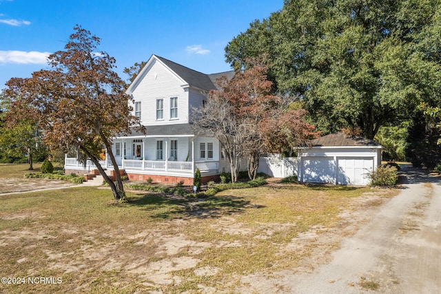 950 Main St, Fair Bluff, NC 28439 - view of front of property with a porch, fence, and driveway