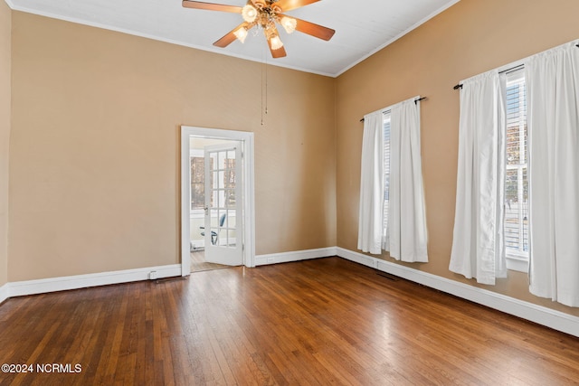 950 Main St, Fair Bluff, NC 28439 - empty room featuring a ceiling fan, hardwood / wood-style floors, baseboards, and ornamental molding