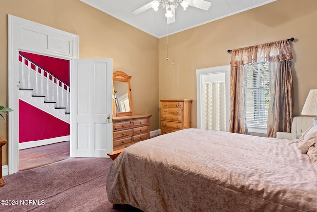 950 Main St, Fair Bluff, NC 28439 - carpeted bedroom with lofted ceiling, a ceiling fan, and crown molding