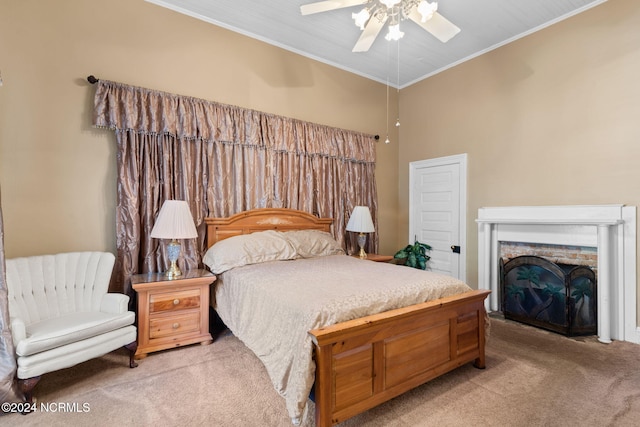 950 Main St, Fair Bluff, NC 28439 - bedroom featuring light colored carpet, crown molding, a fireplace, and a ceiling fan
