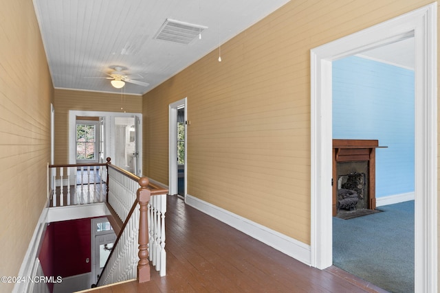 950 Main St, Fair Bluff, NC 28439 - hallway featuring an upstairs landing, wood-type flooring, and baseboards