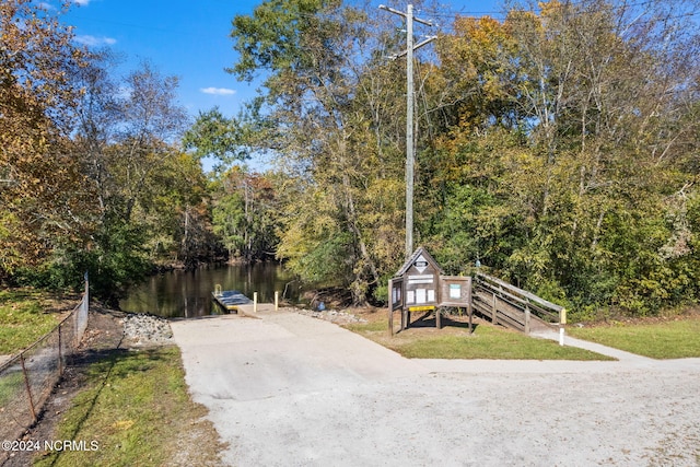950 Main St, Fair Bluff, NC 28439 - view of street with a boat ramp, a water view, and a forest view