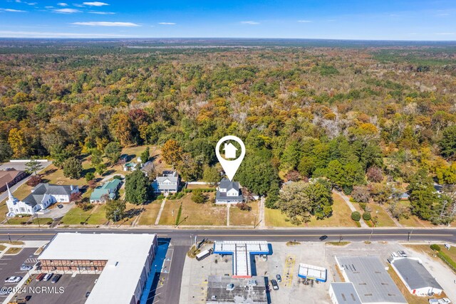 950 Main St, Fair Bluff, NC 28439 - aerial view of property and surrounding area with a forest