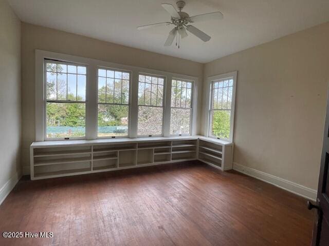 4290 W Church St, Farmville, NC 27828 - spare room with baseboards, ceiling fan, and dark wood-style floors