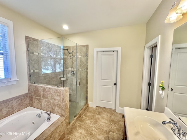 5800 Neelys Ct, Wilmington, NC 28409 - full bath featuring a stall shower, a whirlpool tub, vanity, and baseboards