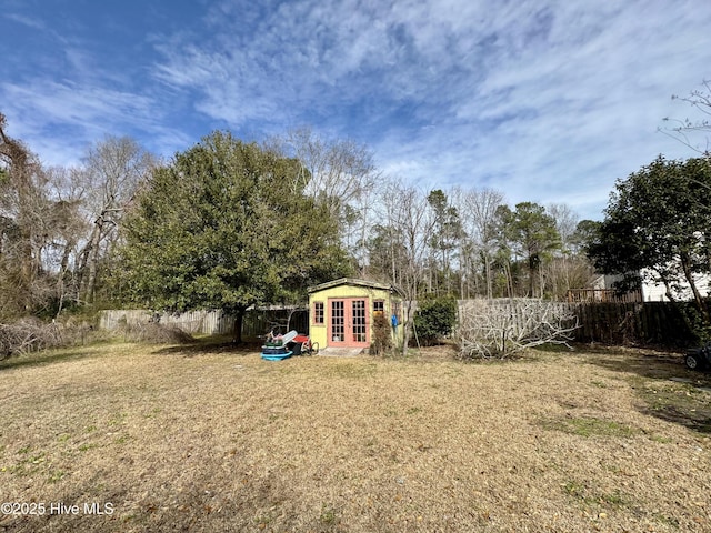 5800 Neelys Ct, Wilmington, NC 28409 - view of yard with french doors and an outdoor structure