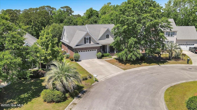 5800 Neelys Ct, Wilmington, NC 28409 - view of front of home featuring concrete driveway and a garage