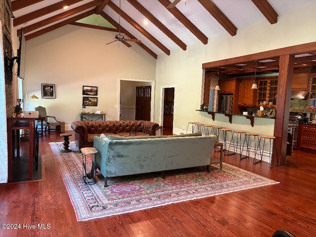 living room with beamed ceiling, ceiling fan, high vaulted ceiling, and dark hardwood / wood-style flooring